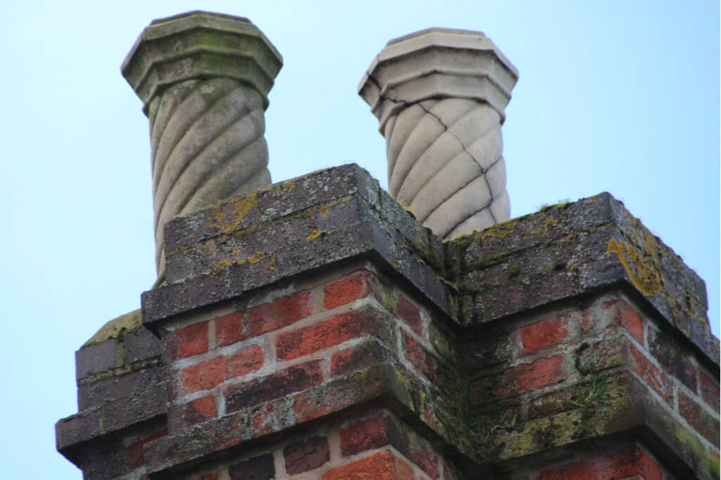 2 chimney pots with decagons and parallel lines