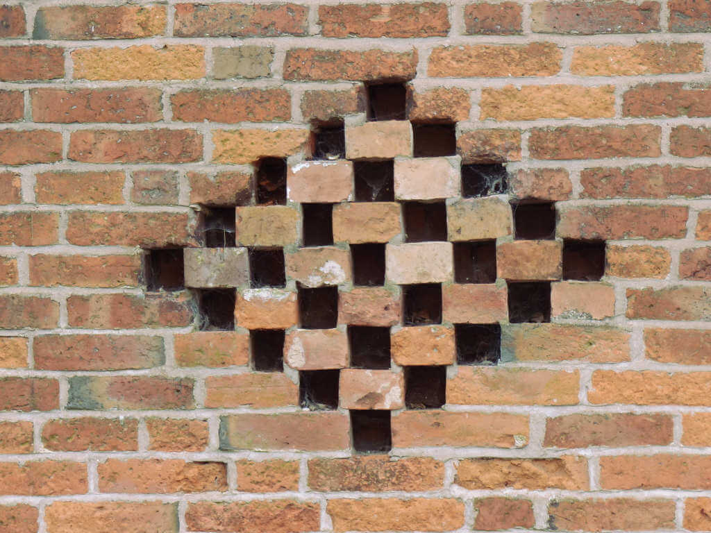 diamond pattern in a brick wall