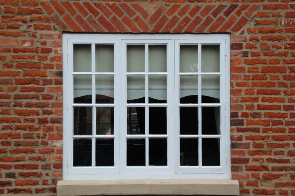 window with rectangles and diagonal brick pattern